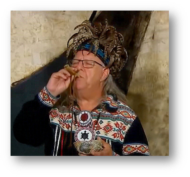 Native Canadian Elder summons the great Western  Grandmother with a turkey whistle