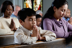 Hands Folded during Prayer at Mass